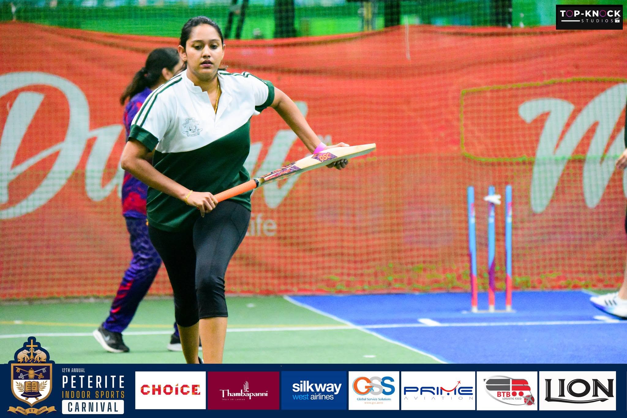 Women’s cricket batting action